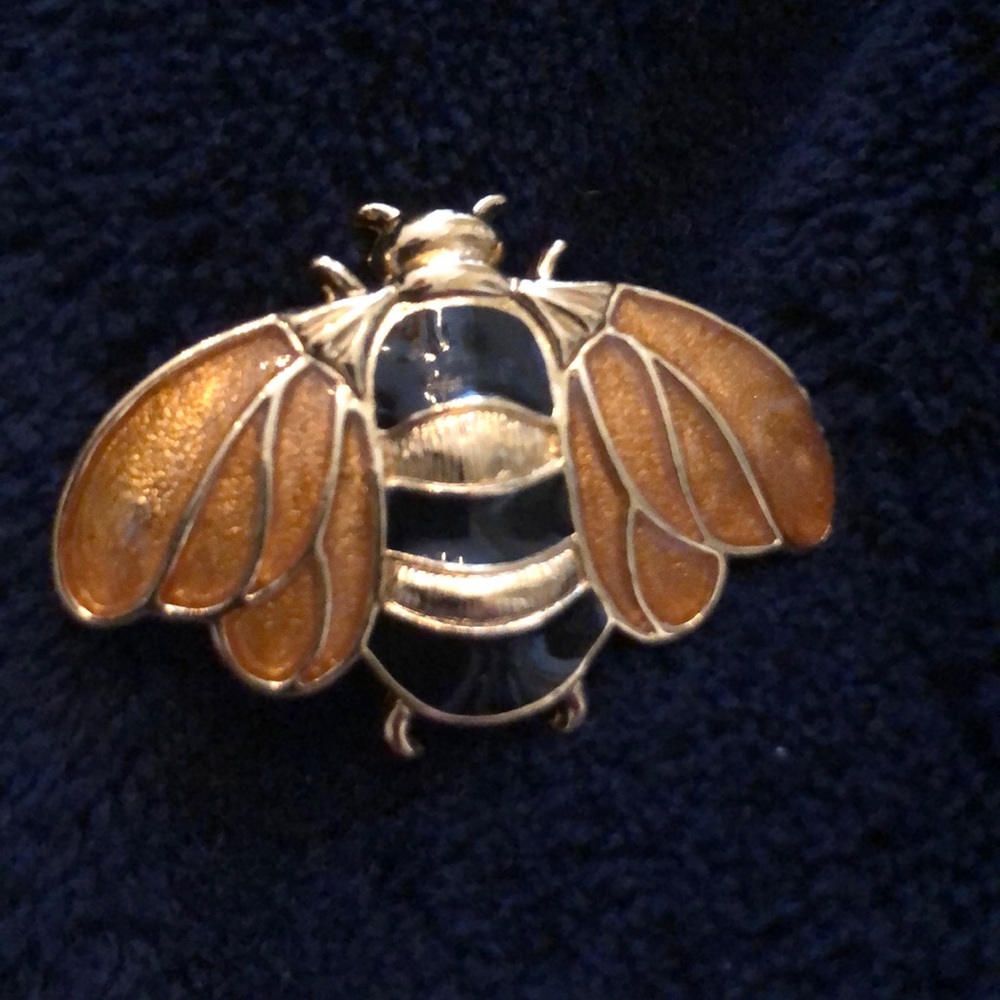 Gold tone with blue/black enameled bee